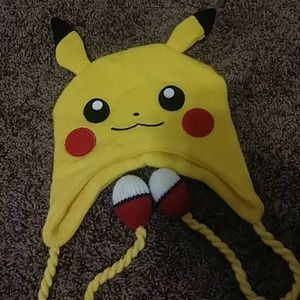 pokemon hat, cat stuffed animals, fox pillow